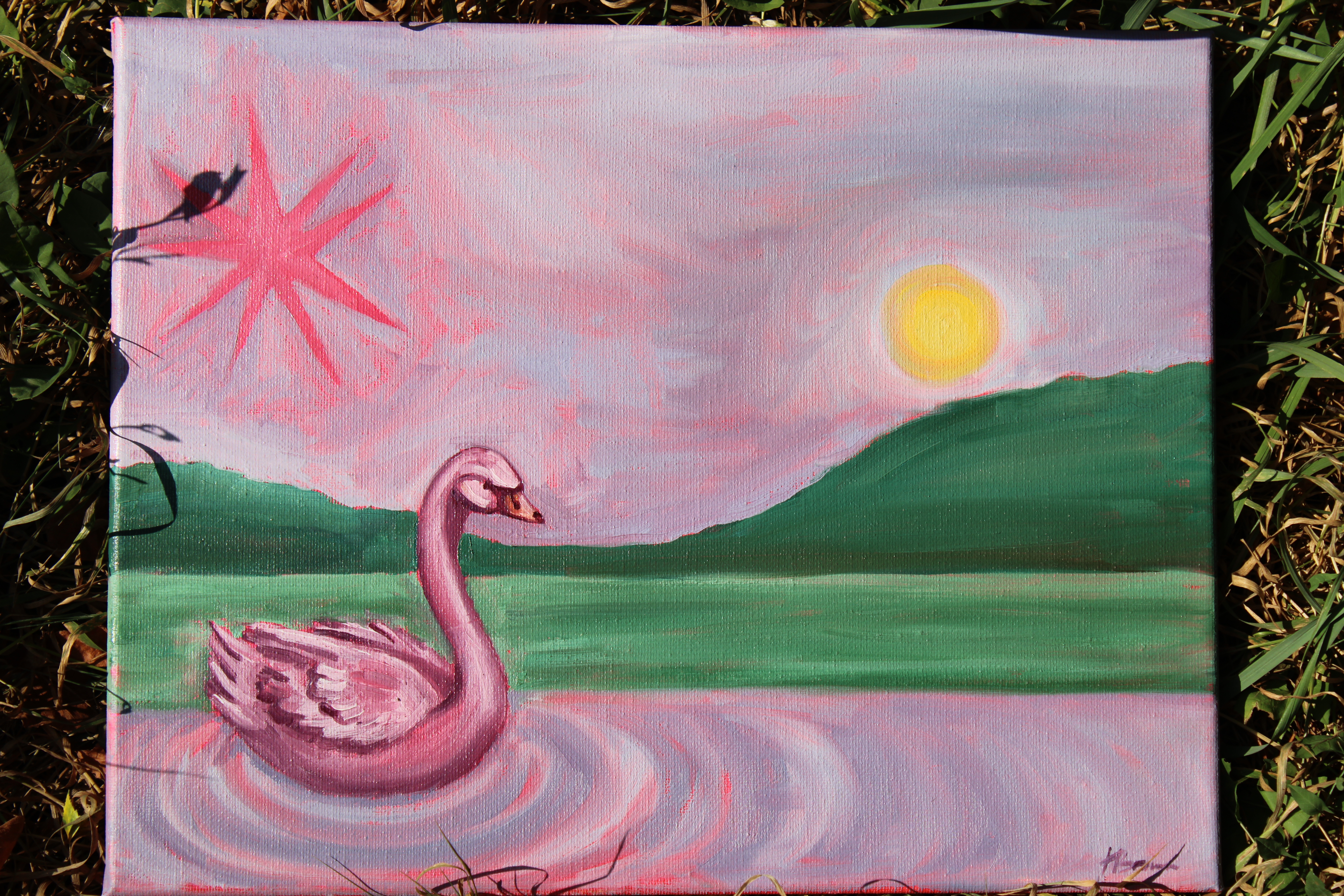 Pink swan painting on a lake beneath a sunset